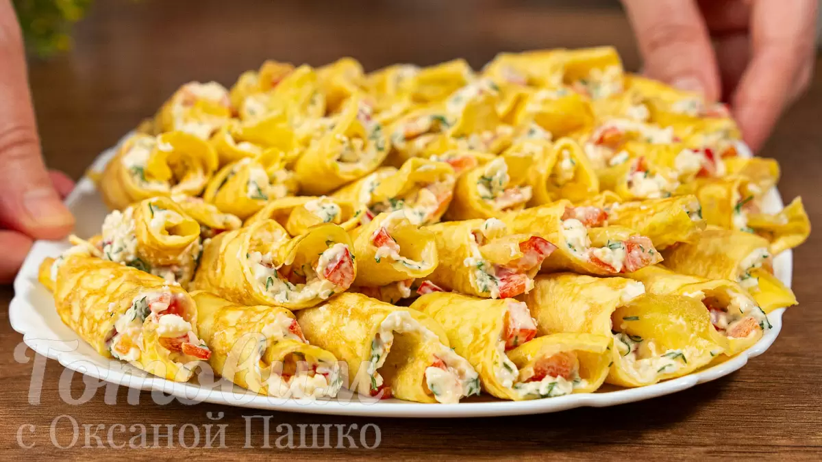 Яичные рулетики с начинкой: вкусная закуска для любого случая